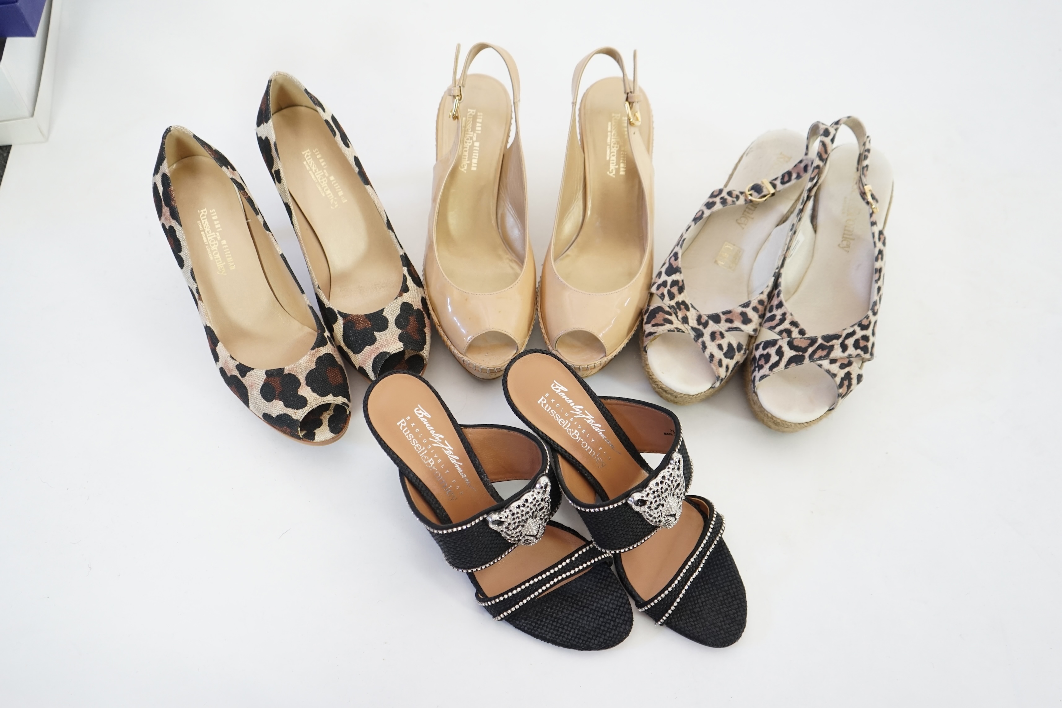 Four pairs of Russell & Bromley lady's heeled sandals, all size 38/38.5. Proceeds to Happy Paws Puppy Rescue